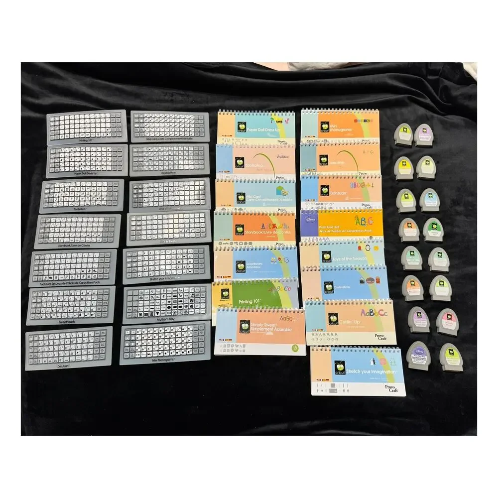 Cricut HUGE LOT 16 Cartridges, Books, Keypad Covers + Jukebox Cartridge Station